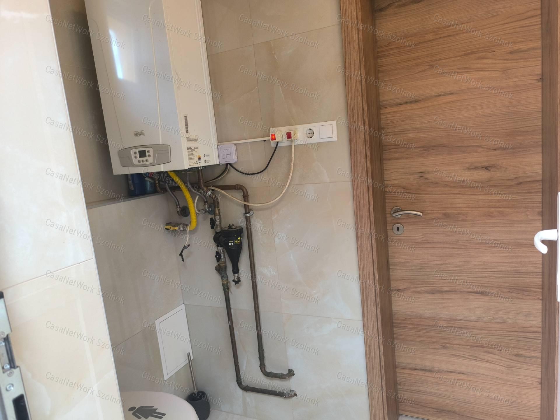 Szandaszőlősi felújított 90 m2-es családi ház eladó!