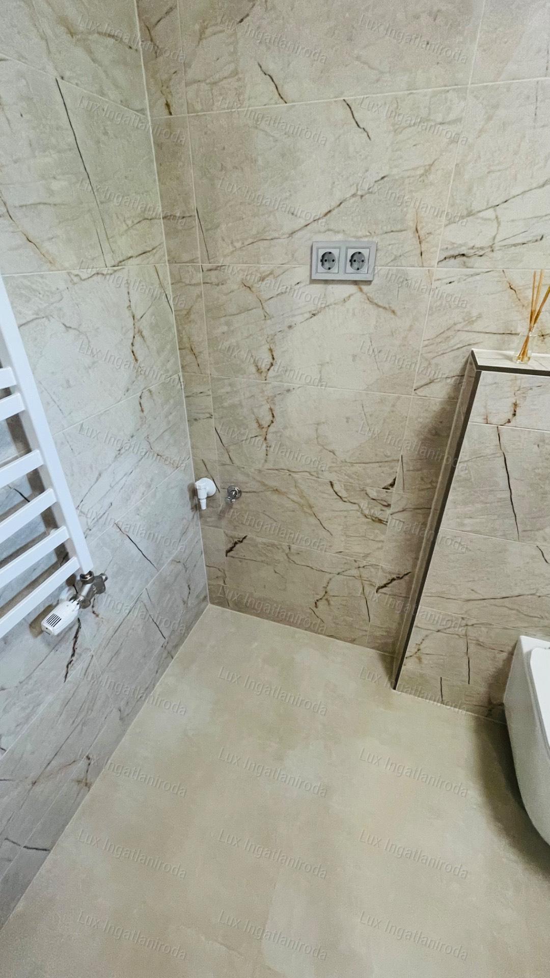 Eladó 94 m2-es társasházi lakás Komáromban, 500 m2-es saját kerttel!